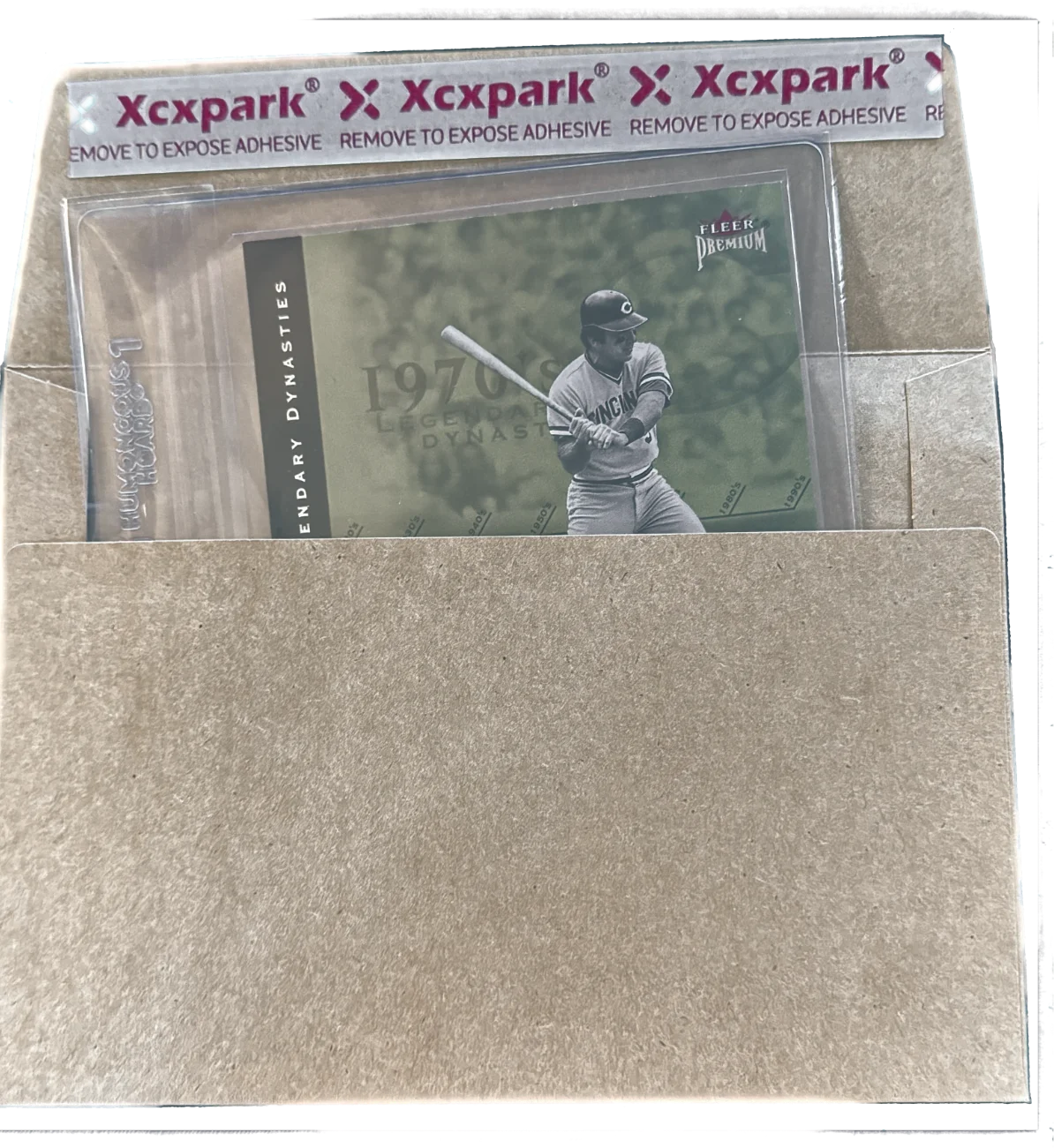 Completed PWE shipment: card in semi-rigid holder inside a kraft envelope, ready to ship